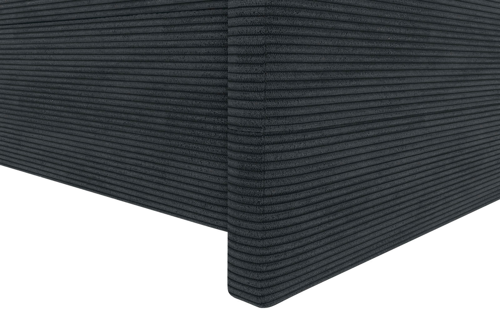 Nahaufnahme einer Ecke eines Boxspringbetts mit dunkelgrauem, geripptem Stoffbezug, perspektivisch von der Seite aufgenommen.