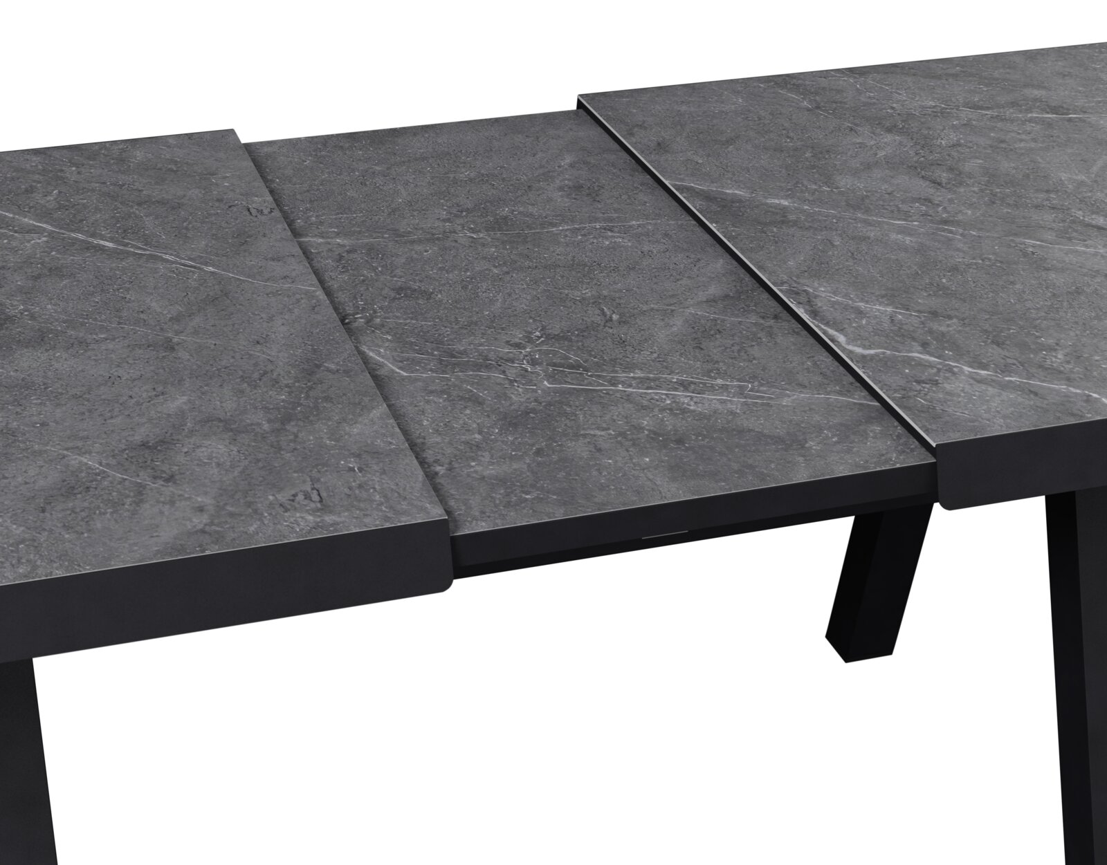 Ausziehbarer kleiner Gartentisch mit grauer Steinoptik, Nahaufnahme der Tischplatte von oben.