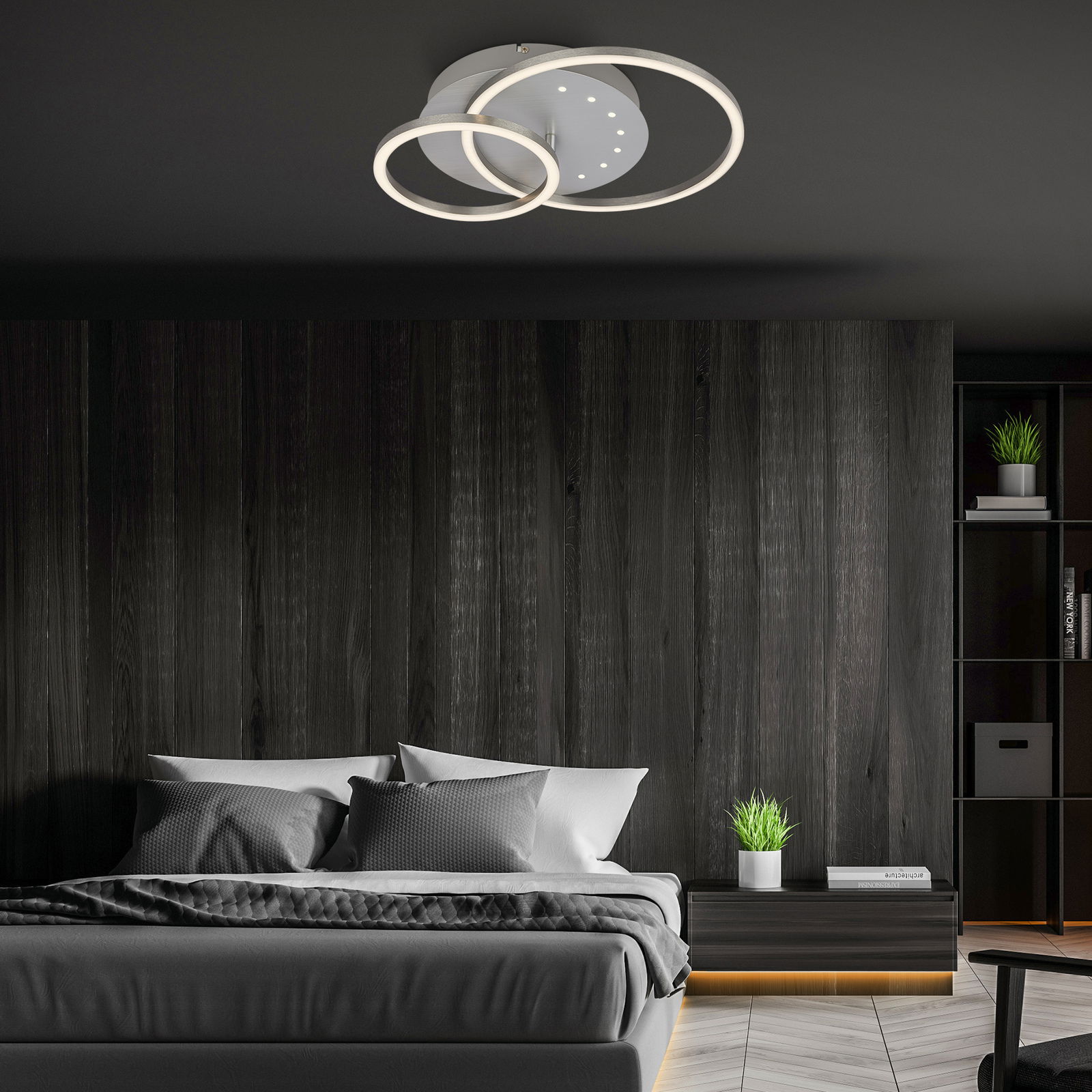 Moderne LED Deckenleuchte mit LEDDots in einem stilvollen Schlafzimmer, von unten betrachtet.