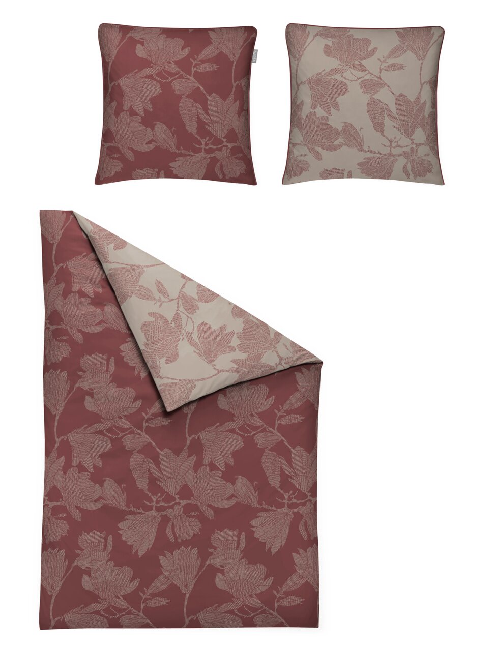 Bettwäsche-Set mit floralem Muster in Rot- und Beigetönen, bestehend aus einem Kissenbezug und einem Bettdeckenbezug, aus der Vogelperspektive.