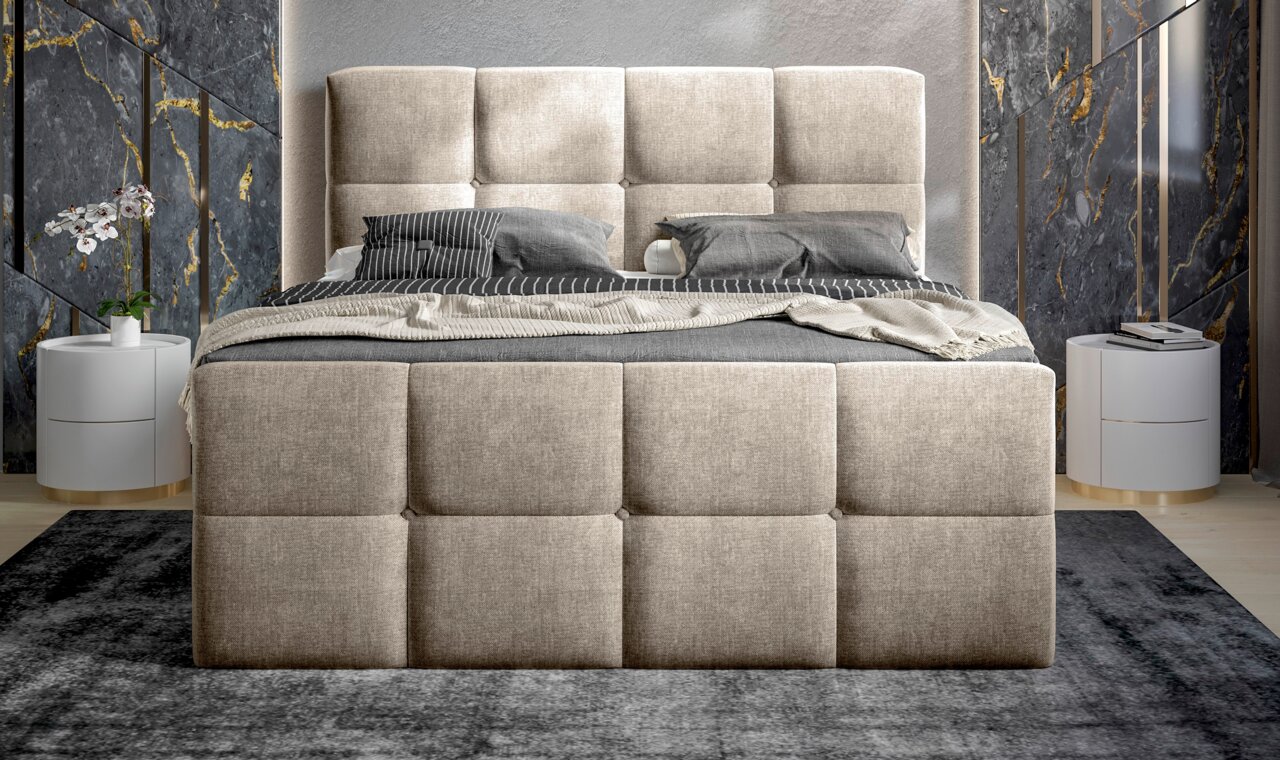 Vooraanzicht van een elegant boxbed met gestoffeerd hoofdeinde in een moderne slaapkamer.