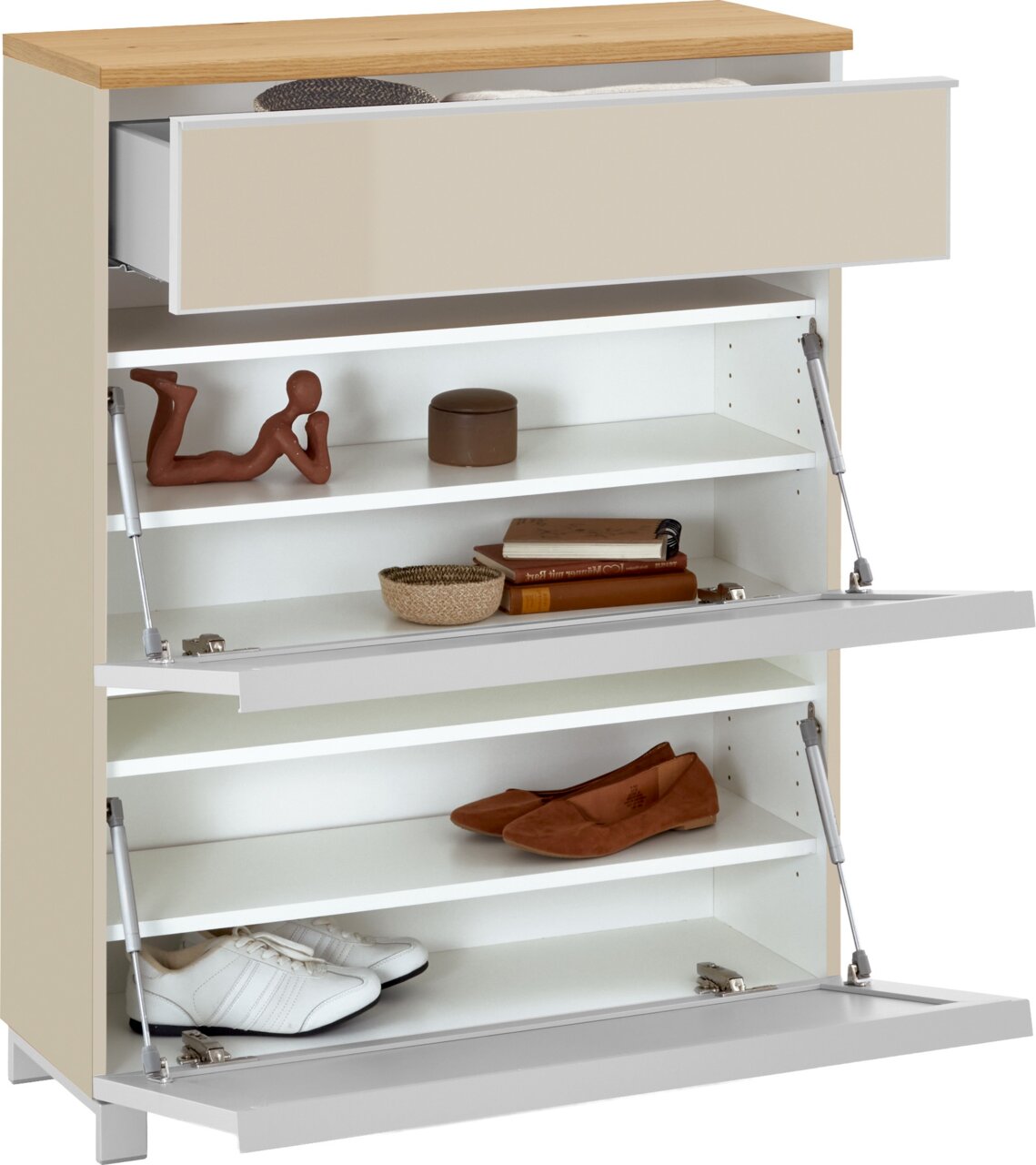 Weißer Schuhschrank mit Holzoptik-Deckplatte, geöffneter Schublade und zwei Klappfächern mit Einlegeböden, schräg von vorn links fotografiert