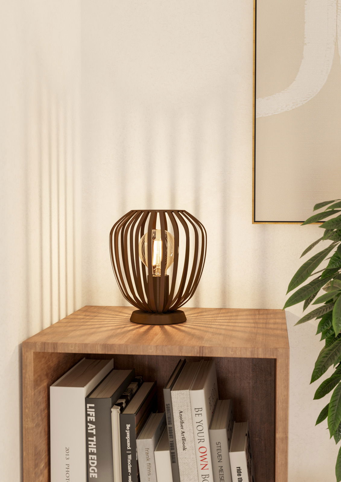 Eglo Leuchten Tischleuchte ESPINAL Moderne Tischleuchte ESPINAL mit offenem, käfigartigem Design, auf einem Holztisch in einer Ecke platziert, seitliche Perspektive.