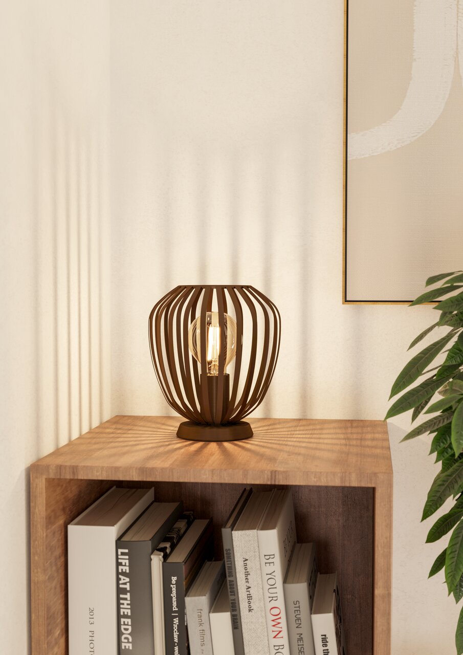 Eglo Leuchten Tafellamp ESPINAL Moderne tafellamp ESPINAL met een open, kooivormig ontwerp, geplaatst op een houten tafel in een hoek, gezien vanaf de zijkant.