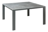 Moderner quadratischer Esstisch mit grauer Steinoptik-Tischplatte und stabilen Metallbeinen, seitliche Perspektive