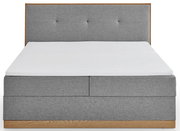 Graues Boxbett mit gepolstertem Kopfteil, Frontalansicht