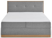 Graues Boxbett mit gepolstertem Kopfteil, Frontalansicht