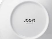 Rückseite eines weißen Tellers mit der Aufschrift 'JOOP! MADE IN GERMANY'.