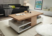Moderner Couchtisch aus Holz und Weiß mit Ablagefächern, seitliche Perspektive