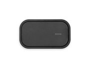 Schwarzer Deckel eines Abfallbehälters aus der Vogelperspektive