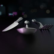 Elegantes Besteckset Merit 66-tlg. in Nahaufnahme, bestehend aus Messer, Löffel und Gabel, auf dunklem Hintergrund.