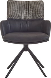 Moderner Drehstuhl mit schwarzer Sitzschale in Lederoptik, gepolsterter Rückenlehne mit schwarz-weißem Stoffmuster und schwarzem Vierfuß-Metallgestell, frontal aus der Vorderansicht freigestellt