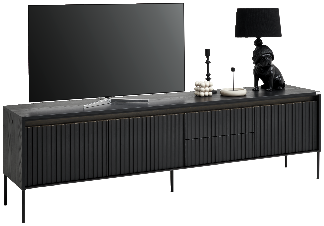 Hom´in TV-Lowboard NOTO Schwarzes TV-Lowboard mit gerillten Türen, dekoriert mit einer Lampe und Accessoires, seitliche Perspektive
