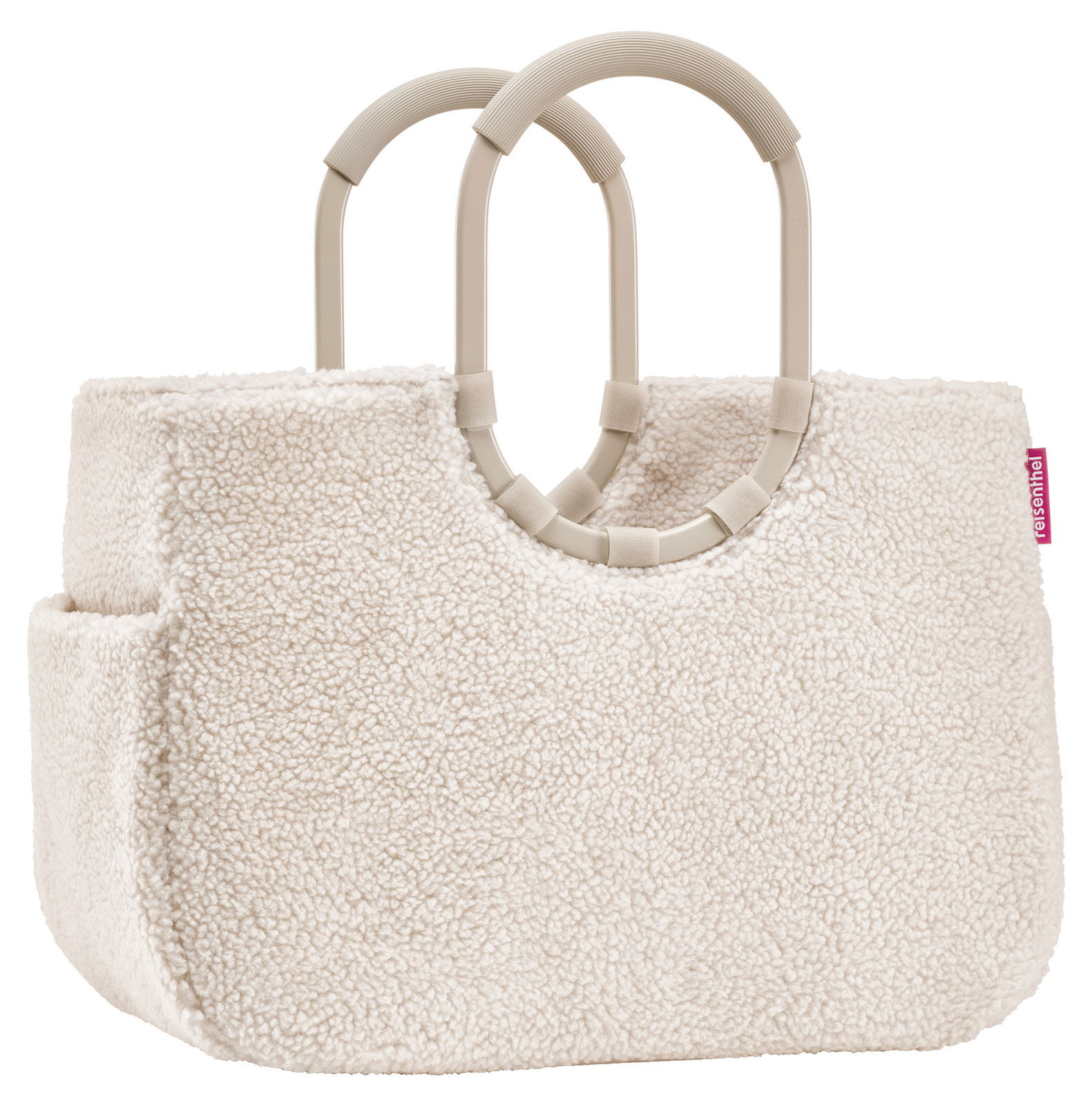 Beige Tasche aus weichem Material mit zwei stabilen Griffen, seitliche Perspektive