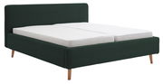 Polsterbettgestell in dunklem Grün mit Holzfüßen, seitliche Perspektive