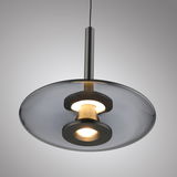 Moderne Pendelleuchte PURE Vitrum mit elegantem, transparentem Schirm und zentralem Leuchtelement, von unten betrachtet.