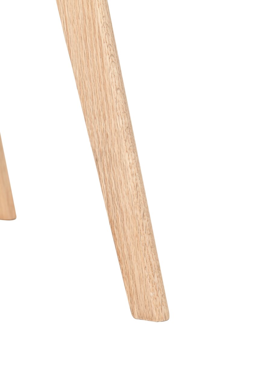 Nahaufnahme eines Stuhlbeins aus hellem Holz, seitliche Perspektive
