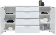 Weißes Sideboard mit offenen Türen und Schubladen, gefüllt mit Geschirr und Dekorationen, frontale Ansicht
