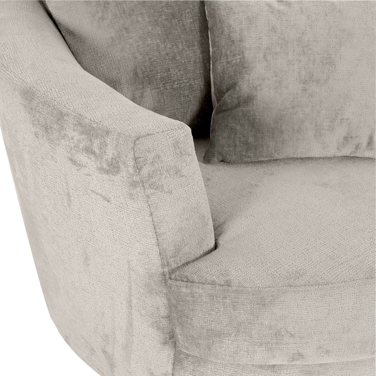 Z2 Sessel LENI Nahaufnahme eines Sessels mit weichem, hellgrauem Stoffbezug und Kissen, seitliche Perspektive