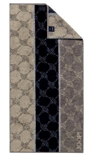 JOOP! Handtuch SIGNATURE in einer Draufsicht, mit einem eleganten Muster in Beige- und Grautönen sowie einem schwarzen Streifen.