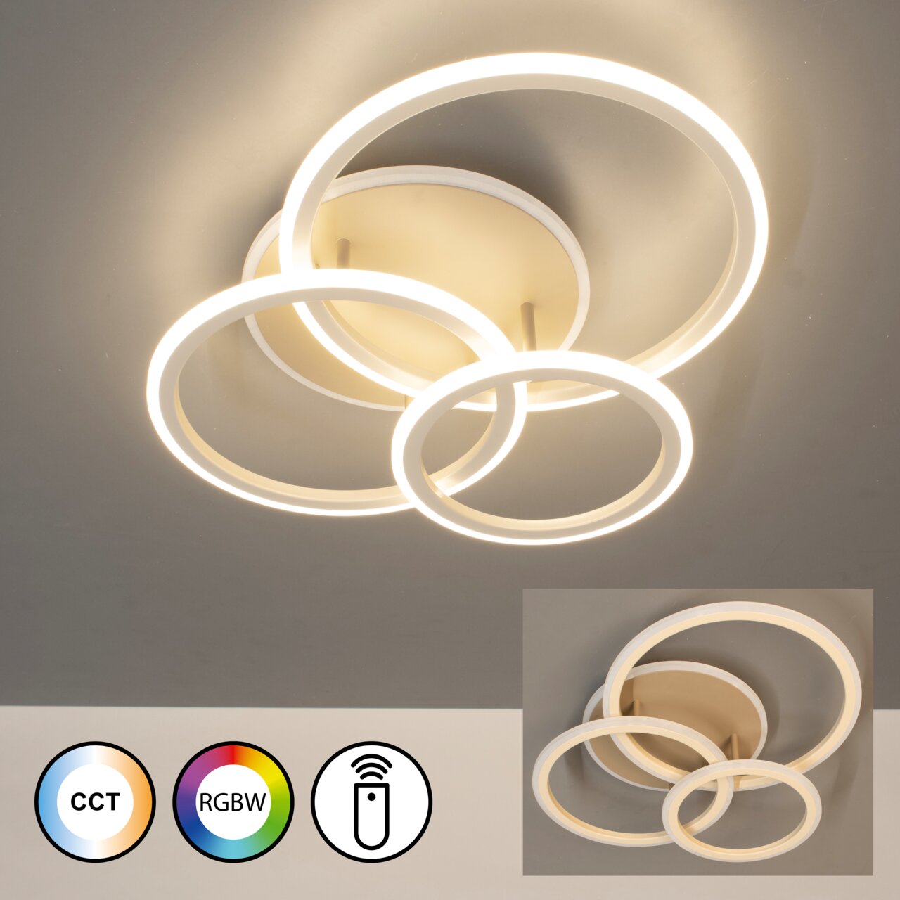 Moderne led-plafondlamp met drie overlappende, verlichte ringen in wit, warmwit licht, gezien van onderaf bij montage aan het plafond; symbolen voor CCT, RGBW en afstandsbediening zichtbaar.