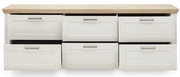 Frontale Ansicht eines Sideboards mit sechs Schubladen, weiß mit Holzoberfläche.