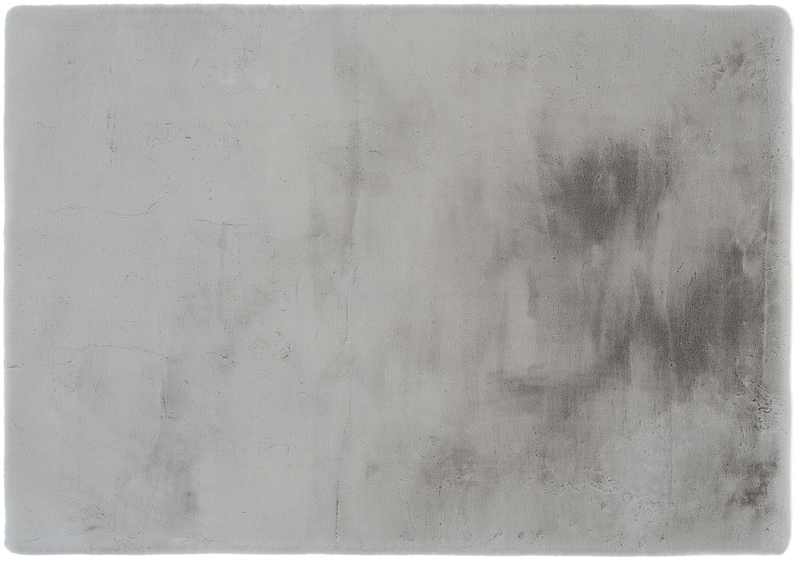 Grauer Fellteppich in rechteckiger Form, Draufsicht