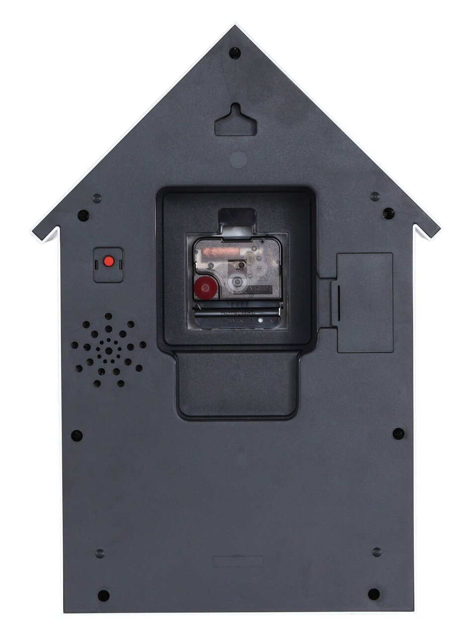 Rückansicht einer Wanduhr in Form eines Hauses mit sichtbarem Uhrwerk und Lautsprecher.