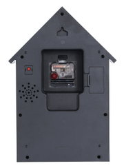 Rückansicht einer Wanduhr in Form eines Hauses mit sichtbarem Uhrwerk und Lautsprecher.