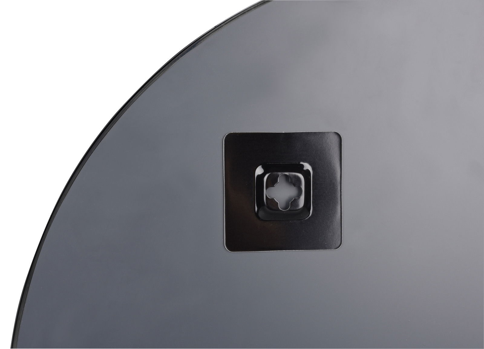 Rückansicht eines runden Spiegels mit einem Befestigungselement in der Mitte.