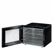 Dörrautomat Basic Elektro Line mit geöffneter Tür, seitliche Perspektive, zeigt die Innenfächer und das Bedienfeld.