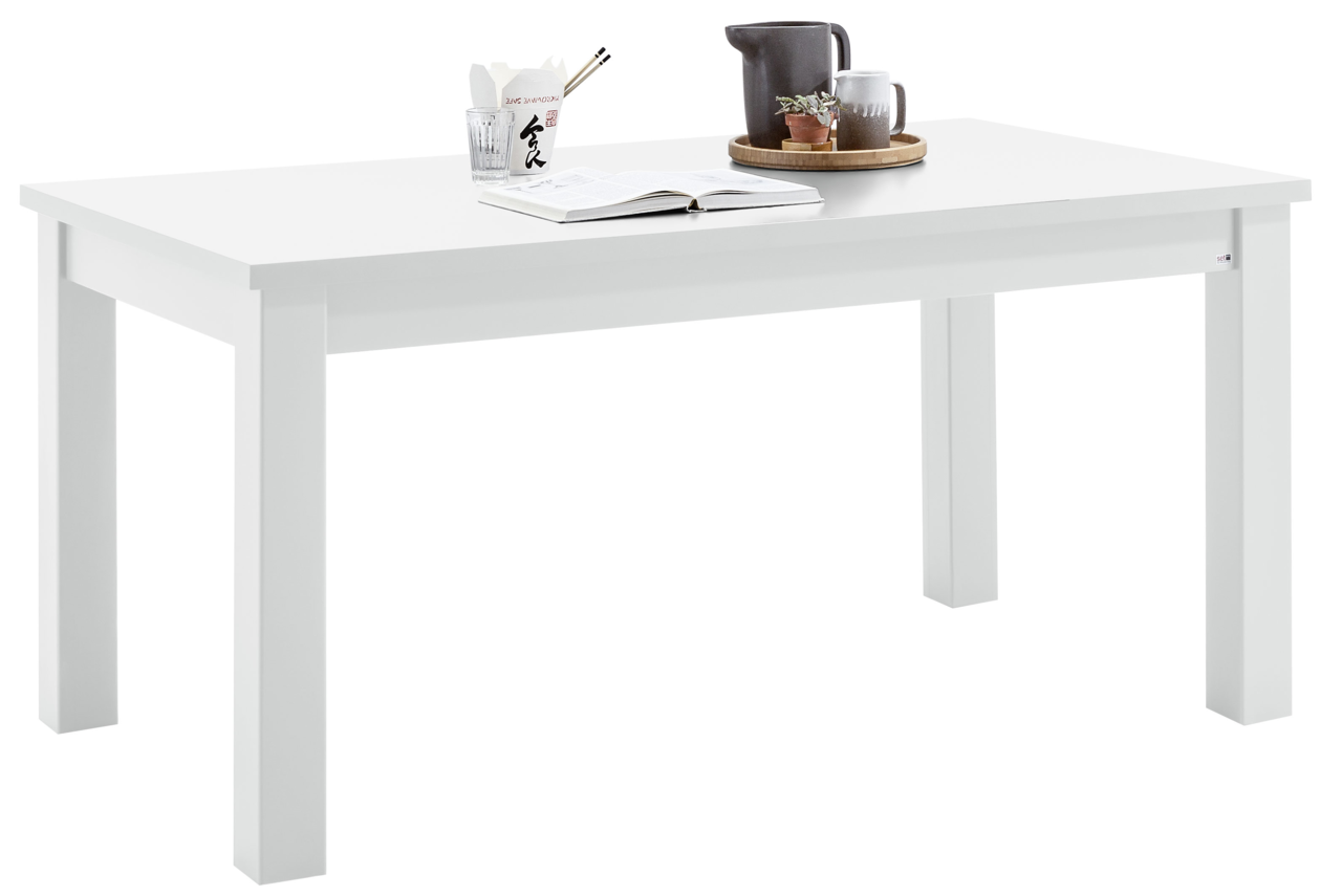 Set one by Musterring Esstisch TACOMA Weißer Esstisch mit Dekoration aus der seitlichen Perspektive