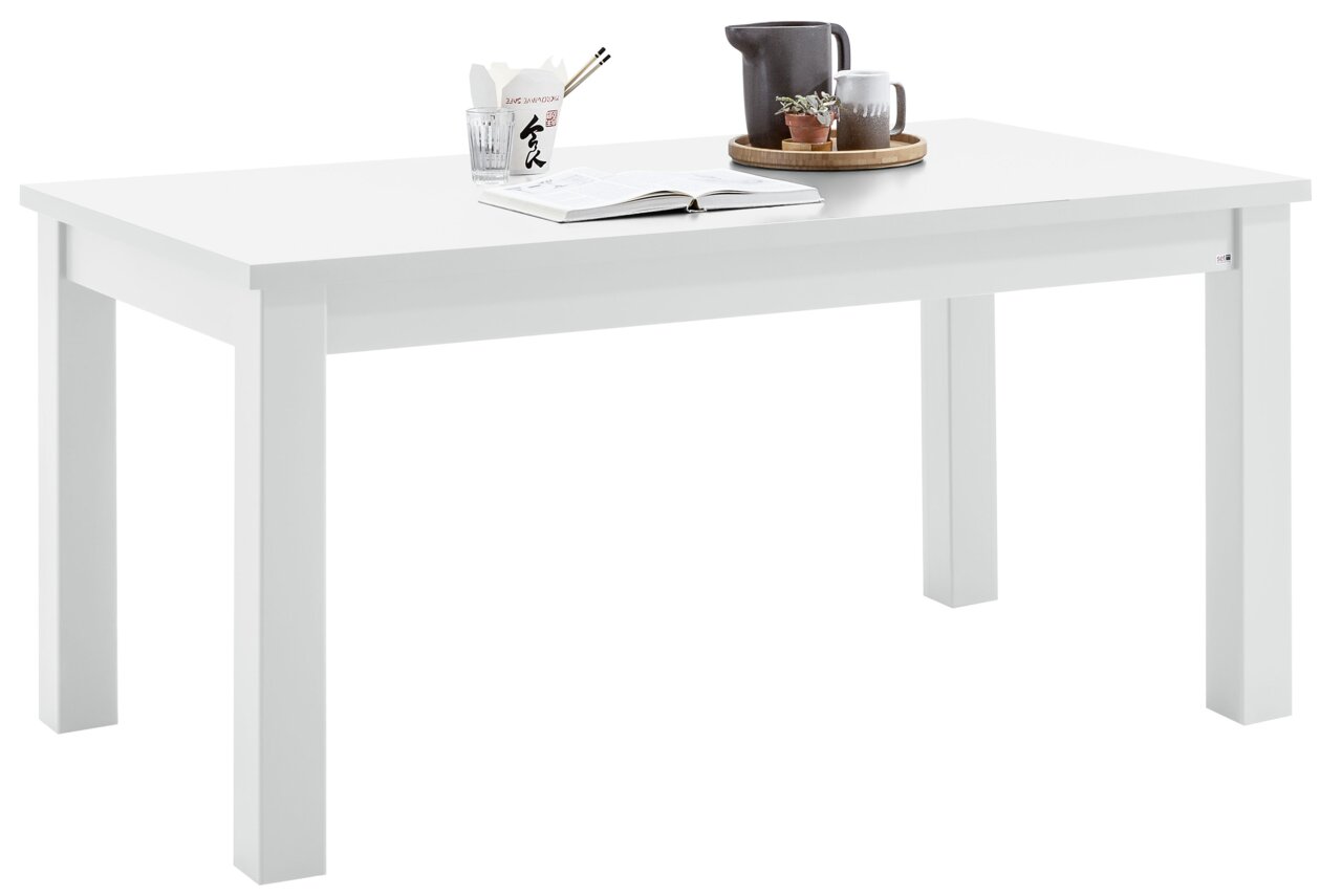 Set one by Musterring Esstisch TACOMA Weißer Esstisch mit Dekoration aus der seitlichen Perspektive