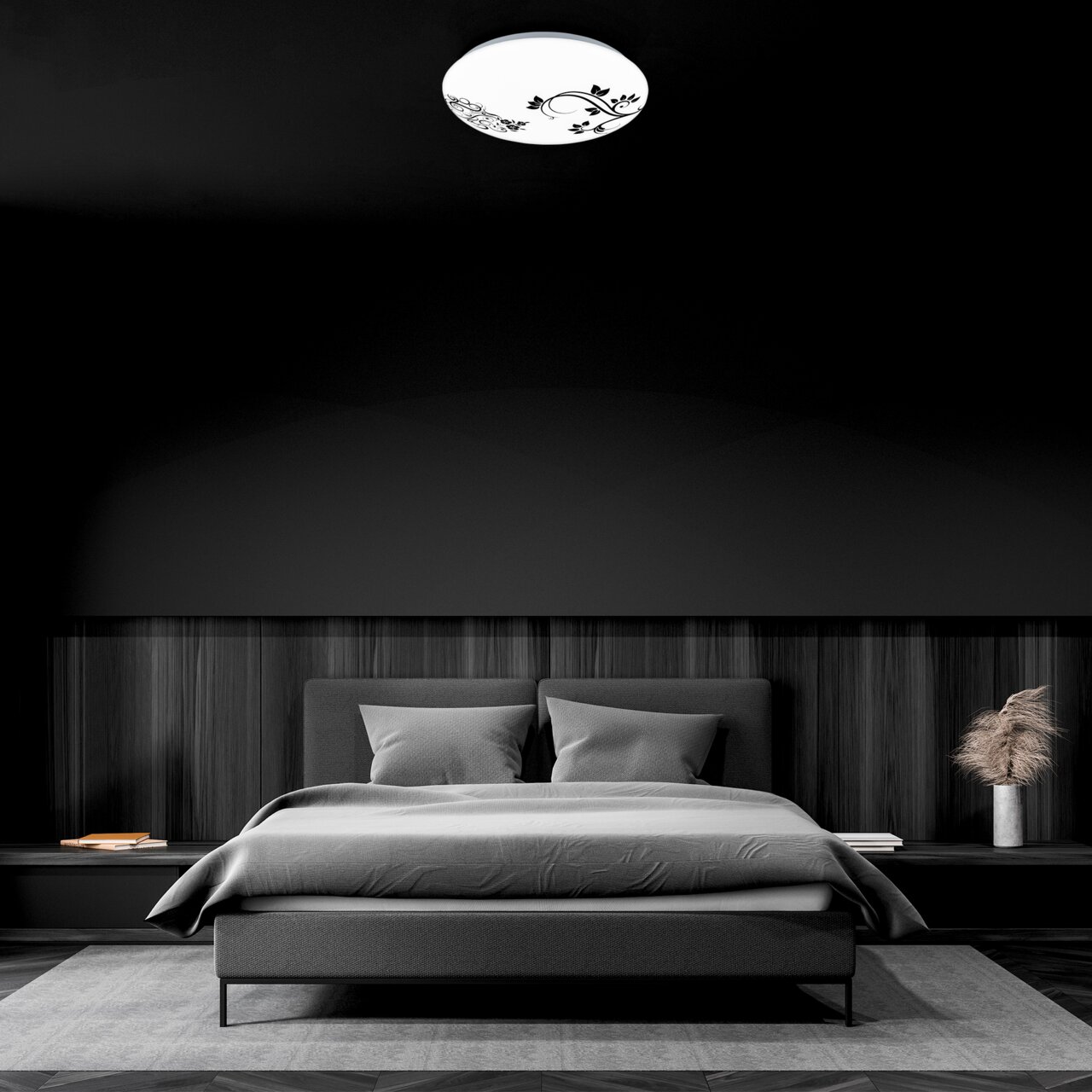 LED Deckenleuchte KORA mit floralem Muster, von unten betrachtet in einem modernen Schlafzimmer.