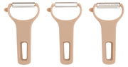 Dreiteiliges Schälerset in beige, bestehend aus drei Schälern mit unterschiedlichen Klingen, frontal abgebildet.