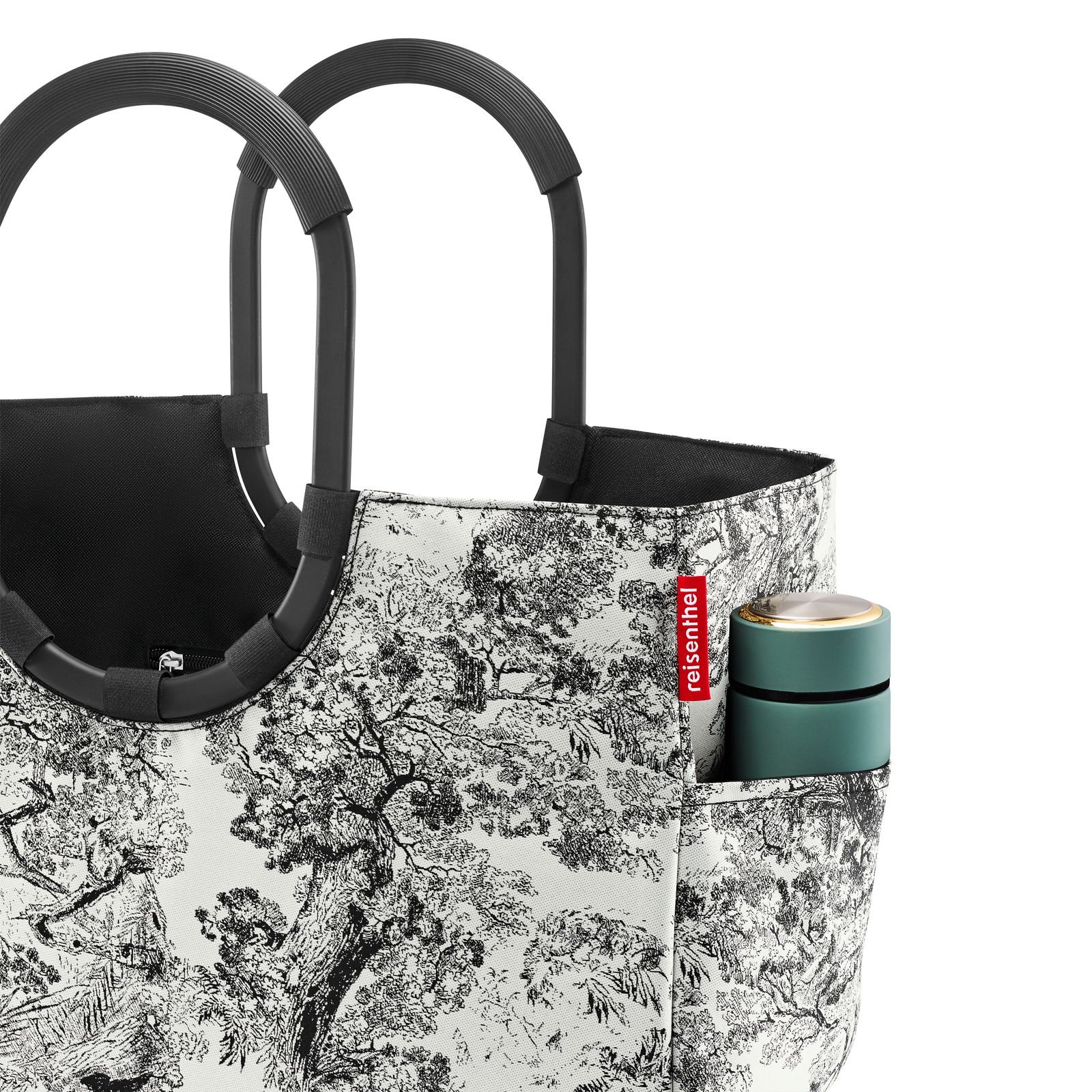 Loopshopper L mit schwarzem Griff und schwarz-weißem Baum-Muster, seitliche Perspektive, mit einer kleinen Tasche an der Seite.