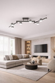 Moderne zwarte LED-plafondlamp met geometrische armen en zeven ronde lichtpunten, van onderaf gezien in een stijlvolle woonkamer