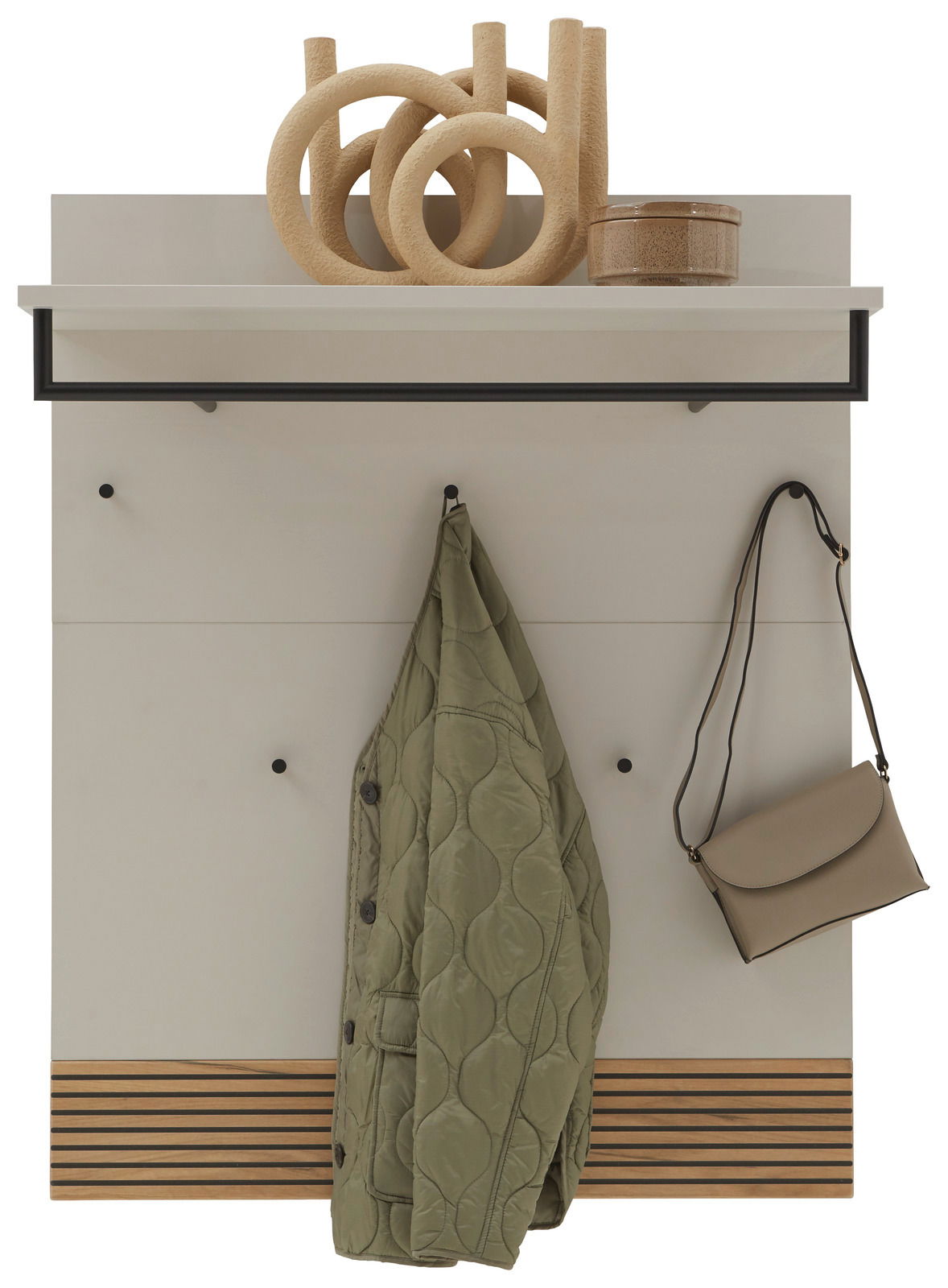 Garderobenpaneel mit Haken, Ablage und Dekoration, frontal betrachtet. Ein grüner Mantel und eine beige Tasche hängen an den Haken.