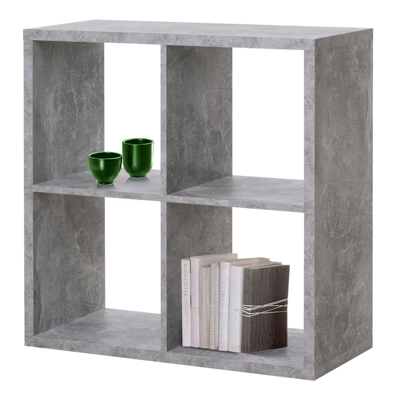 Grauer Regalwürfel mit vier Fächern, zwei grüne Tassen und Bücher, seitliche Perspektive