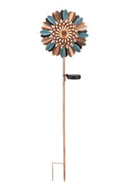 Zonne-lamp in de vorm van een decoratieve windmolen met kleurrijke wieken, zijaanzicht