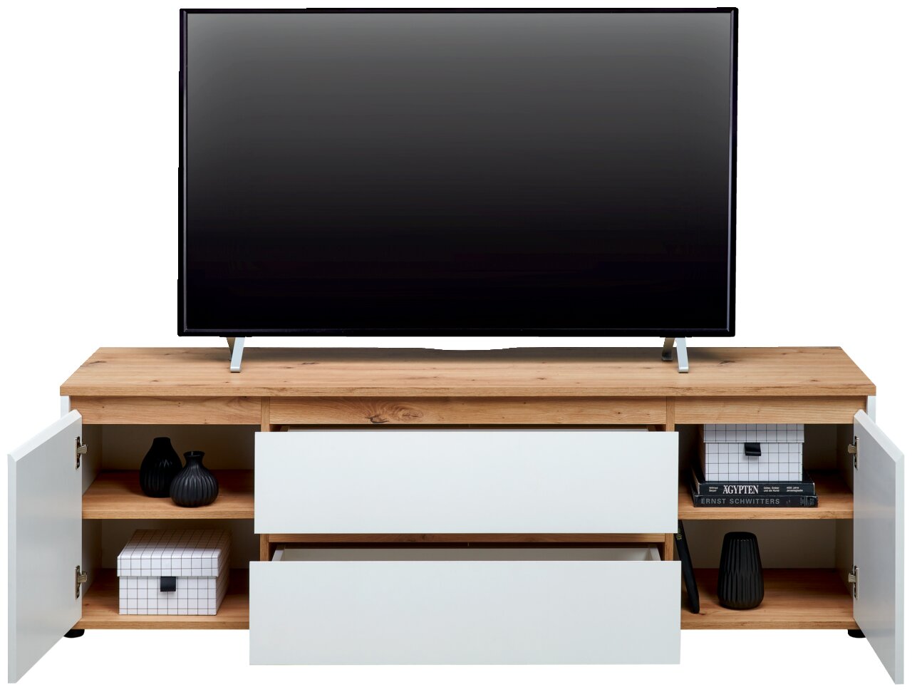 TV-Lowboard aus Holz mit weißem Finish, zwei offenen Schubladen und zwei seitlichen Schränken, frontal betrachtet.