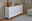Weißes Sideboard mit Holzplatte, zwei Türen und drei Schubladen, seitliche Perspektive