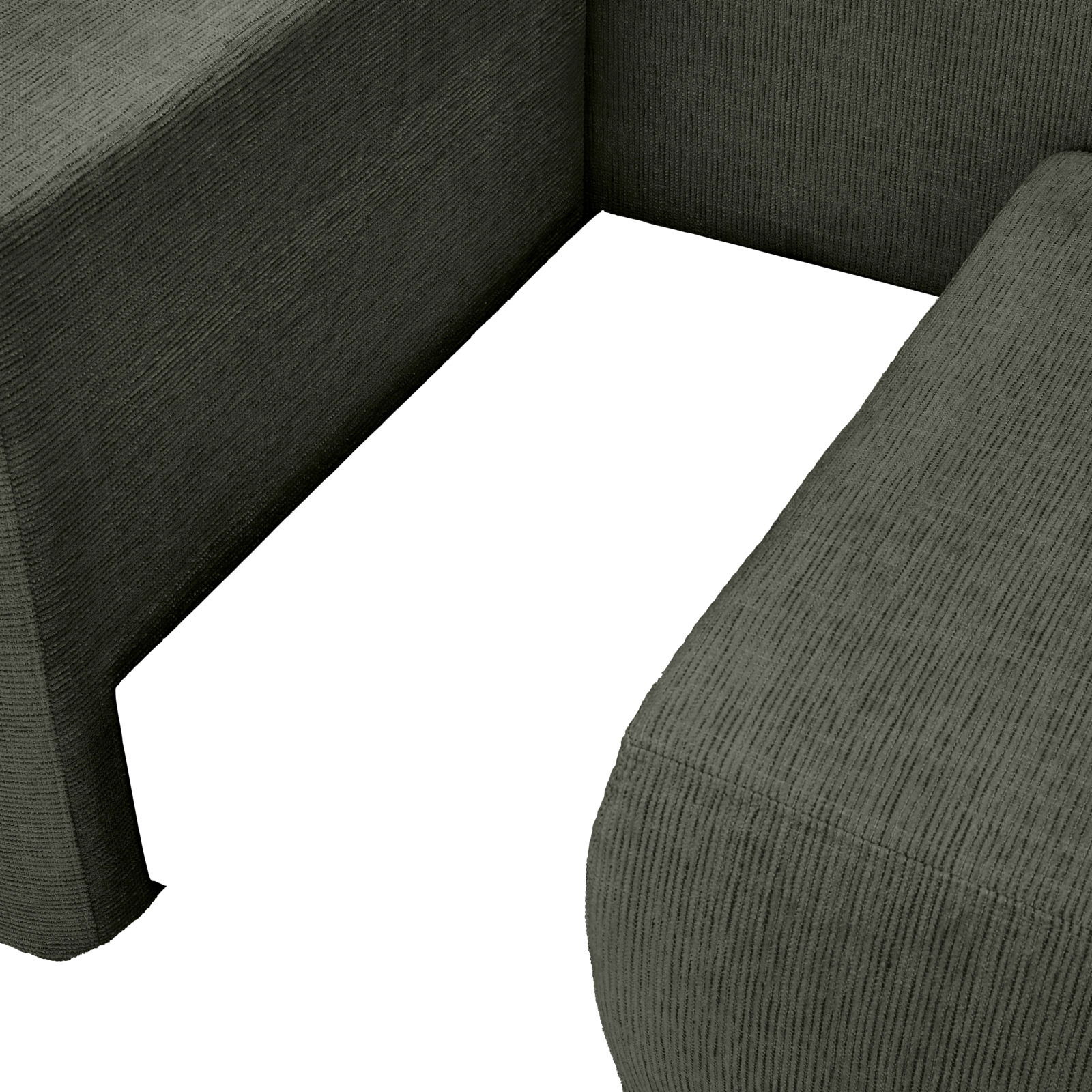 Nahaufnahme einer Recamiere in dunkelgrünem Stoff, Perspektive von oben.