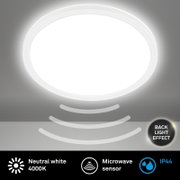 Ronde led-plafondlamp met bewegingssensor, neutraal wit licht 4000 K, achtergrondverlichtingseffect, IP44, aanzicht van onderaf.