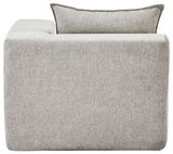 Rückansicht eines grauen Ecksessels mit rechter Armlehne, modernes Design