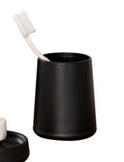 Schwarzer Aufbewahrungsbecher Kira mit Zahnbürste, seitliche Perspektive