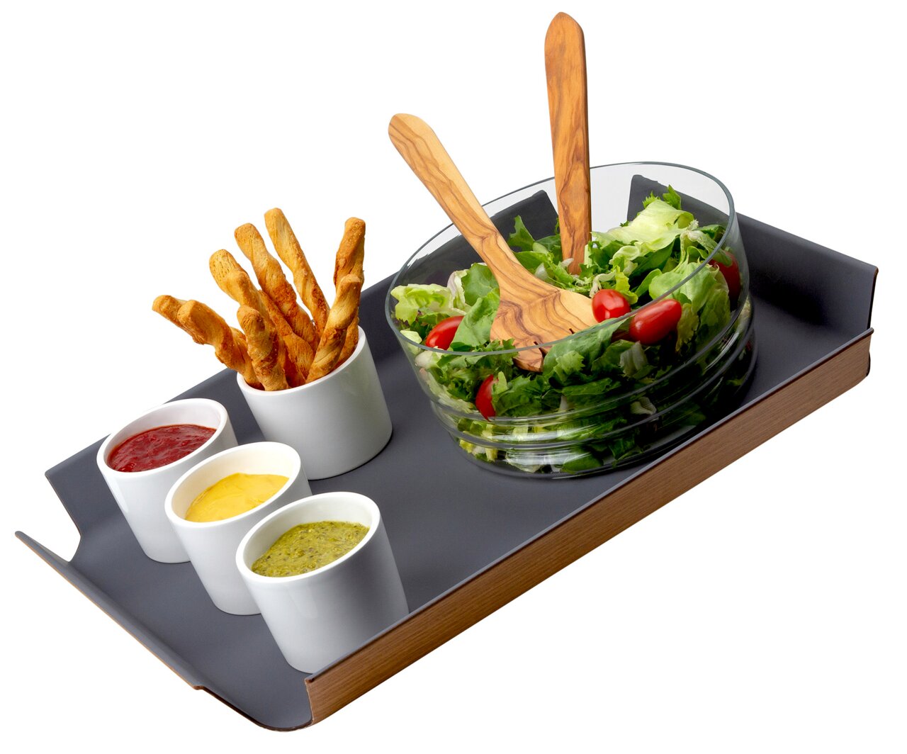 Graues, rutschfestes Tablett mit einer Salatschüssel, drei kleinen Schälchen mit Dips und Brotstangen, aus der Vogelperspektive.