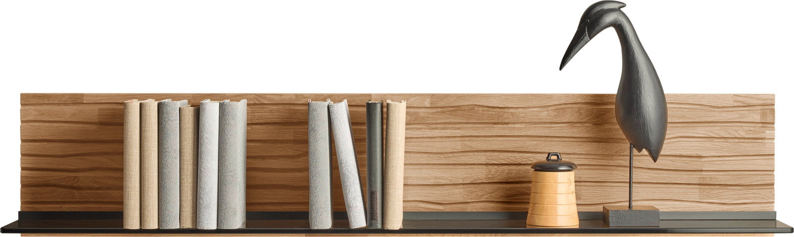 Houten plank met boeken, een zwart vogelbeeldje en een klein bakje, zijaanzicht
