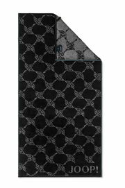 Schwarzes Handtuch mit grauem Muster und JOOP! Logo, Draufsicht