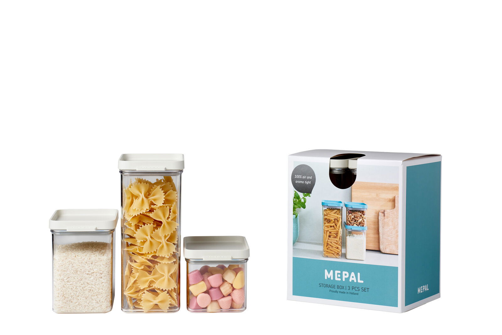 Vorratsdose Omnia 3er Set in Weiß, bestehend aus drei unterschiedlich großen, transparenten Behältern mit weißen Deckeln, gefüllt mit Reis, Nudeln und Süßigkeiten. Perspektive: Frontalansicht.